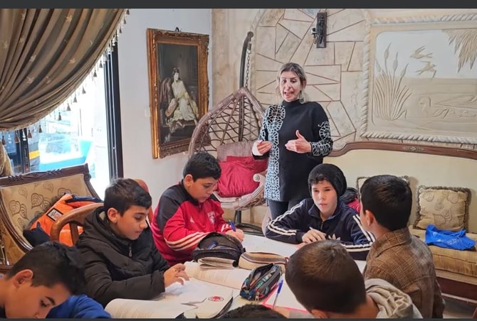 Lebanese English language teacher Sawsan Mohammad Diab has converted her home into a classroom for her students not to lose their academic year amid an ongoing strike by public education teachers. (Supplied)