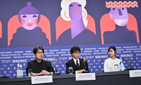 (L-R) Japanese producer Genki Kawamura, Japanese director and screenwriter Makoto Shinkai and Japanese actress Nanoka Hara attend a press conference for the film 
