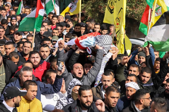 Palestinians attend the funeral of a man shot dead by Israeli forces in the West Bank on Feb. 3, 2023. (AFP)