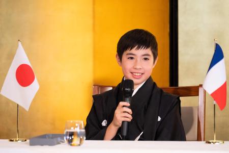 Ten-year-old kabuki actor Maholo Terajima attends a press conference at the French embassy in Tokyo on February 7, 2023. (AFP)