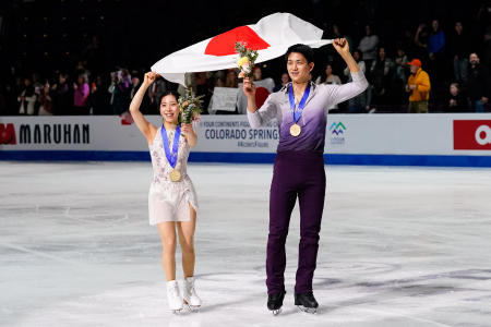 Gold medalists Japan's Riku Miura and Ryuichi Kihara smile during the victory ceremony. (AFP)