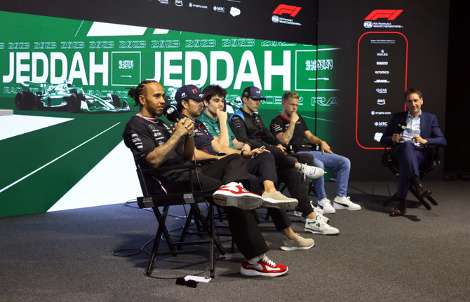 Red Bull's Sergio Perez, Mercedes' Lewis Hamilton, Aston Martin's Lance Stroll, Haas' Kevin Magnussen and Alpine's Esteban Ocon during the press conference on March 16, 2023, ahead of the Saudi Arabian Grand Prix in Jeddah. (Reuters)