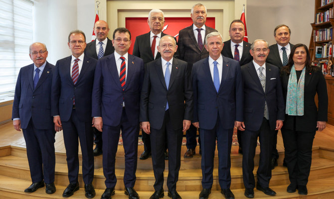 Kemal Kilicdaroglu, leader of Republican People's Party, poses with mayors from his party during a meeting in Ankara. There are still several uncertainties about the approaching elections. (Reuters)