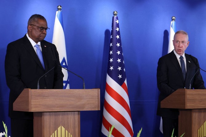 Israeli Minister of Defence Yoav Gallant, right, and US Secretary of Defence Lloyd Austin deliver a statement to the press near Ben Gurion airport in Tel Aviv, on March 9, 2023. (AFP)