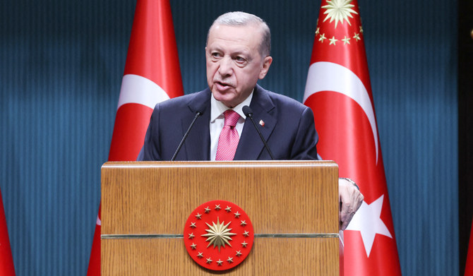Turkish President Recep Tayyip Erdogan speaks after signing the decree announcing that national general elections will he held on May 14, at the Presidential Complex or Kulliye in Ankara on March 10, 2023. (AFP)