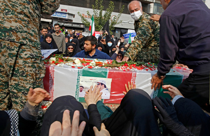 Iranians rally in Tehran to denounce a mass shooting at a key shrine that killed more than a dozen worshippers in Shiraz. (File/AFP)