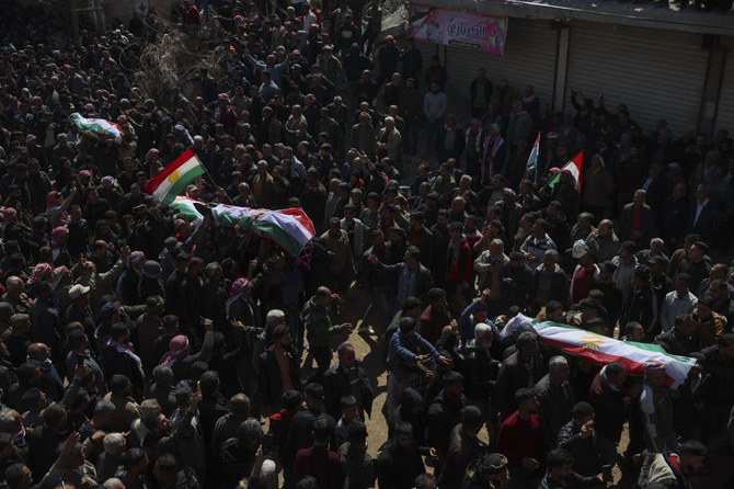 People attend funeral of four Kurds in the town of Jinderis, Syria, on March 21, 2023. (AP)