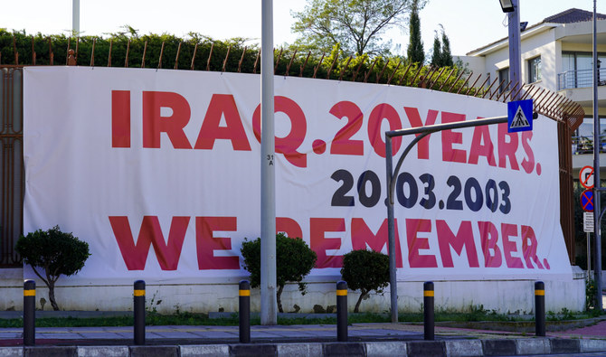 A large banner is displayed on the outer wall of the Russian embassy facing the US embassy in Nicosia on March 20, 2023. (AFP/File)