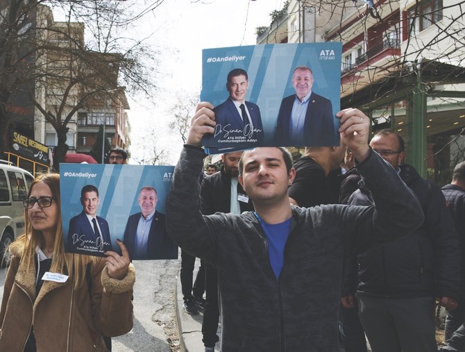Supporters of election candidates campaign near the Supreme Election Board in Ankara on Sunday. (AP)