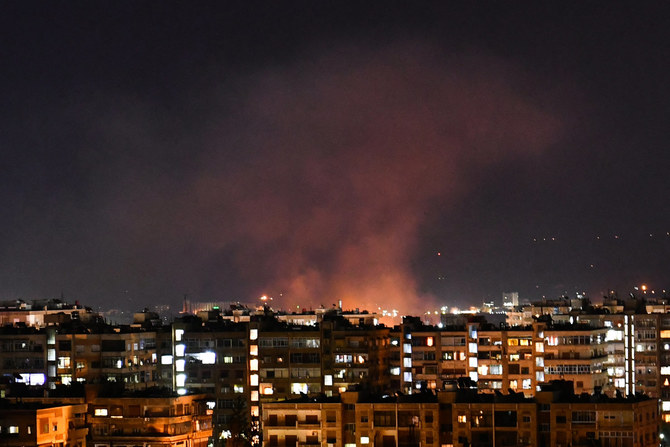 In this picture taken on July 20, 2020, smoke billows in Damascus following an Israeli airstrike targeting south of the capital Damascus. (AFP)