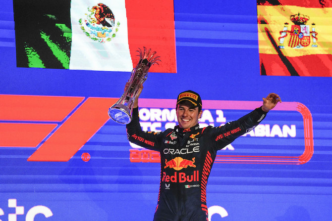 Sergio Perez won the Saudi Arabian Grand Prix and Max Verstappen drove from 15th to second to give Red Bull a 1-2 finish in Jeddah. (AP)