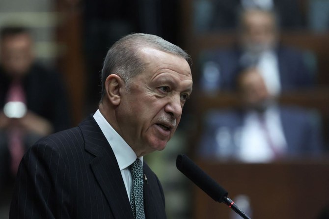 Turkish President and Leader of the Justice and Development (AK) Party, Recep Tayyip Erdogan attends his party's group meeting at the Turkish Grand National Assembly in Ankara. (AFP)