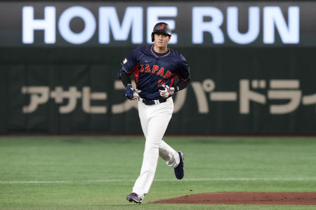 Shohei Ohtani of Japan rounds the bases after hitting a 3-run home run in the 1st inning against Australia during their Pool B game at the World Baseball Classic at the Tokyo Dome Sunday, March 12, 2023, in Tokyo. (AP)