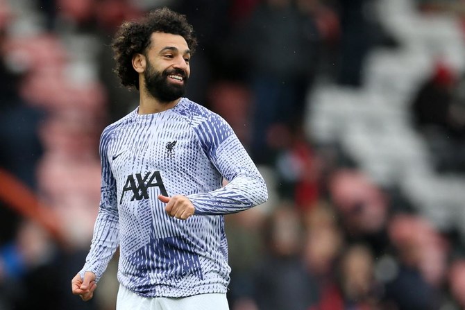 Liverpool’s Egyptian striker Mohamed Salah warms up ahead of the English Premier League football match between Bournemouth and Liverpool at the Vitality Stadium in Bournemouth, southern England on March 11, 2023. (AFP)