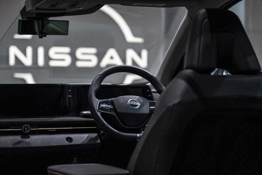 This photo taken on March 30, 2023 shows the driver's seat in a cutaway display model of one of Nissan's electric vehicles (EV) at the global headquarters of Japanese automaker Nissan Motor in Yokohama, Kanagawa prefecture. (AFP)