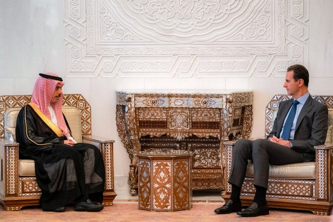 Saudi Foreign Minister Prince Faisal bin Farhan met with Syrian President Bashar al-Assad in Damascus. Apr. 18, 2023 (AFP)