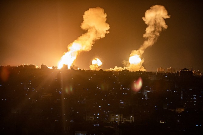 Smoke rises above buildings in Gaza City as Israel launches air strikes on the Palestinian enclave on late April 6, 2023. (AFP)