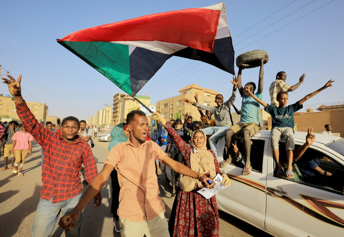 Protesters march during a rally in Khartoum, marking the fourth anniversary of a 2019 sit-in that led to the overthrow of former President Omar Bashir. (Reuters)