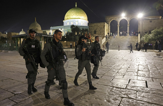 Israeli security forces patrol outside the Dome of the Rock shrine in Jerusalem's al-Aqsa Mosque compound during the holy fasting month of Ramadan, on April 8, 2023. (AFP)