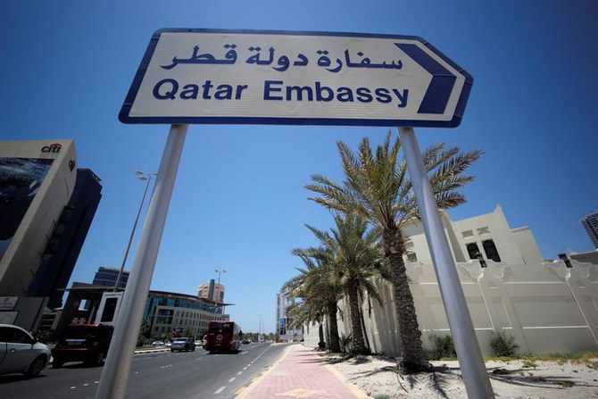 A sign indicating a route to Qatar embassy is seen in Manama, Bahrain, June 5, 2017. (Reuters)