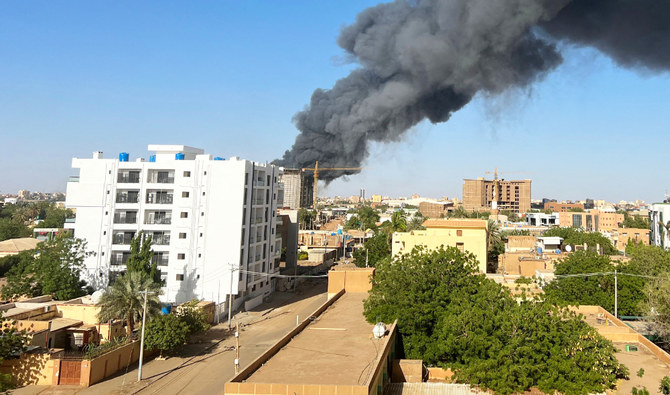 Thick smoke billowed into the sky and the streets in Khartoum were largely empty. (AFP)