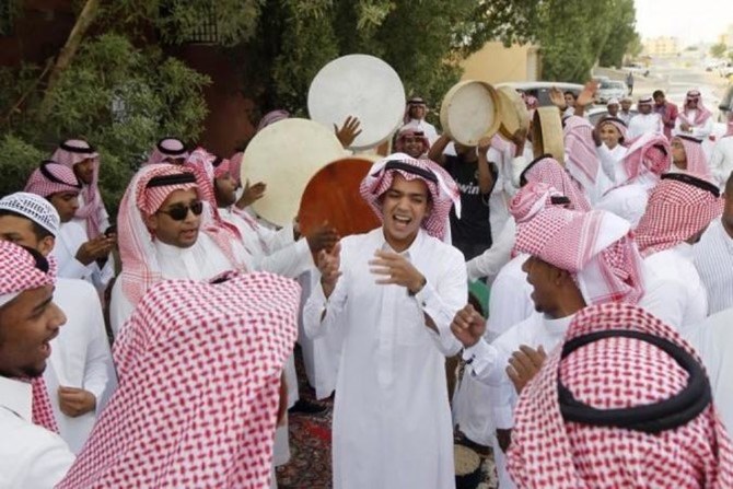 Saudi youth dance as they celebrate Eid Al-Fitr in Riyadh. (Reuters/File)