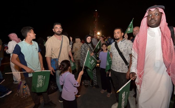 Saudi citizens and other nationals arrive at King Faisal naval base in Jeddah, following their rescue from Sudan. (AFP)