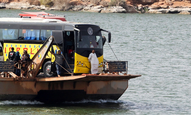 People cross the River Nile in a ferry, after being evacuated to Abu Simbel city, at the upper reaches of the Nile in Aswan, Egypt, April 26, 2023. (Reuters)