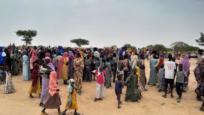 Sudanese people wait to be registered at the camp near the border between Sudan and Chad in Adre, Chad April 26, 2023. (Reuters)