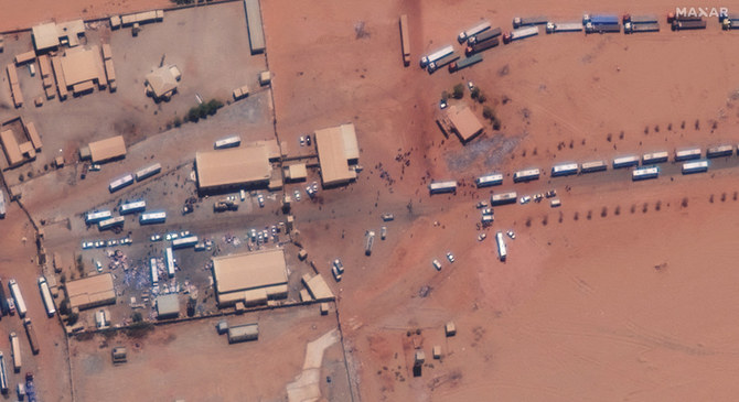 A satellite view shows buses as they wait near the eastern border post highway between Egypt and Sudan on April 28, 2023. (Satellite image 2023 Maxar Technologies/Handout via REUTERS)