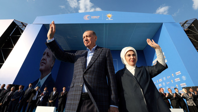 Turkish President Tayyip Erdogan and wife Emine Erdogan greet supporters during a rally ahead of the May 14 elections, in Izmir, Turkey April 29, 2023. (Reuters)