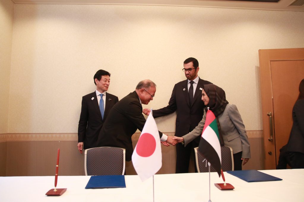 The UAE's Minister of Industry and Advanced Technology Dr. Sultan Al Jaber and Japan's Minister of Economy, Trade and Industry NISHIMURA Yasutoshi witness the signing of agreements between ADNOC and Japanese partners. (Twitter/ @ADNOCGroup)