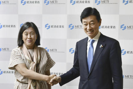 US Trade Representative Katherine Tai (left) shakes hands with Japan’s Economy Minister Yasutoshi Nishimura before their talk in Tokyo, Wednesday, April 19, 2023. (AP)