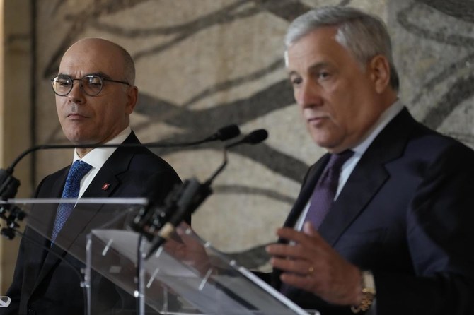 Tunisia Foreign Affairs Minister Nabil Ammar, left, listens to Italy's Foreign Minister Antonio Tajani during a joint press conference at La Farnesina Foreign Minister headquarters in Rome. (AP)