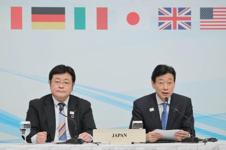 Japan's Minister of the Environment Akihiro Nishimura (left) and Japan's Minister of Economy, Trade and Industry Yasutoshi Nishimura (right) attend the G7 Ministers' Meeting on Climate, Energy and Environment in Sapporo, Hokkaido prefecture on April 16, 2023. (Photo by JIJI PRESS / AFP)