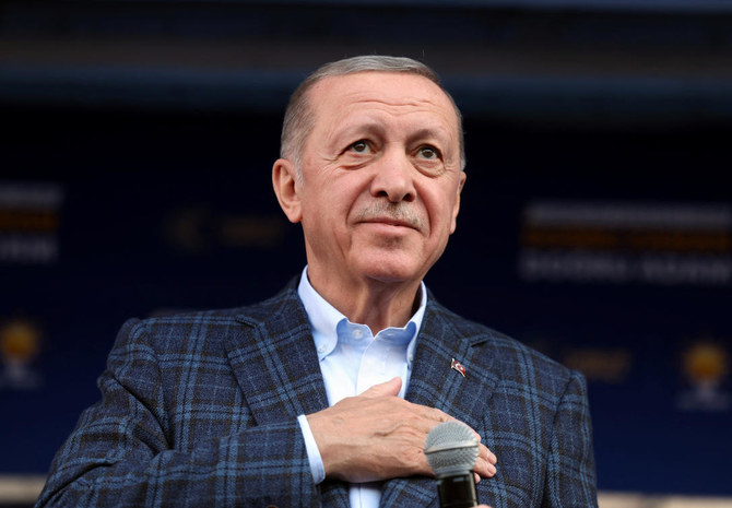 Turkish President Recep Tayyip Erdogan has been campaigning tirelessly to reverse a dip in polls and extend his two-decade election winning streak. (Presidential Press Office via Reuters)