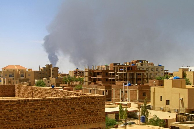 Smoke billows over residential buildings in Khartoum on May 1, 2023 as deadly clashes between rival generals' forces have entered their third week. The top United Nations humanitarian official is heading to the Sudan region due to the 