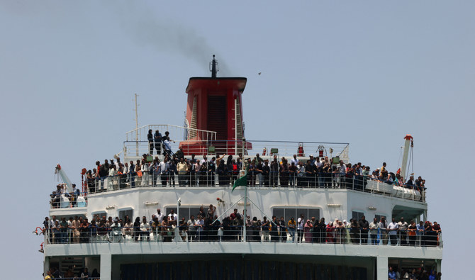 A ferry transports some 1900 evacuees across the Red Sea from Port Sudan to the Saudi King Faisal navy base in Jeddah, on April 29, 2023, during evacuation efforts of people fleeing Sudan. (AFP)