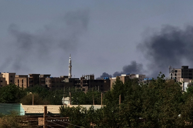 Smoke billows amid persistent fighting in the Sudanese capital, Khartoum, on May 4, 2023, despite extended truce agreements between the warring groups. (AFP)