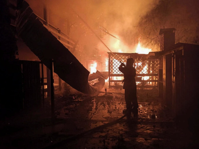 A firefighter works at the site of a resort area hit by a Russian missile strike, amid Russia's attack on Ukraine, in Odesa region (Reuters)