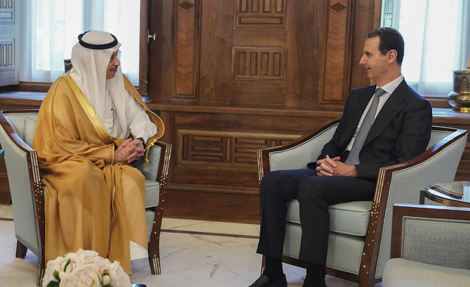 Syrian President Bashar Al-Assad meets with Saudi Arabia’s ambassador to Jordan Nayef Al-Sudairi, in Damascus, Syria, May 11, 2023. (AP)