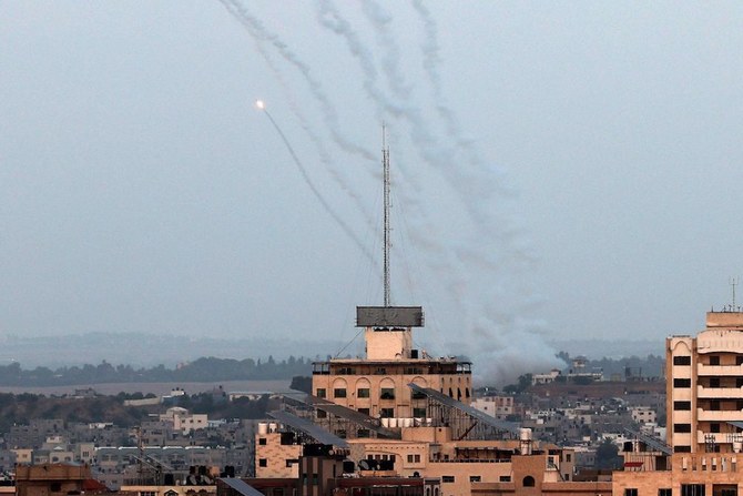 Rockets are fired from Gaza City towards Israel on May 13, 2023. Israeli air strikes battered Gaza again on May 13 in response to rocket fire from militants as deadly fighting resumed after a night of relative calm. (AFP)
