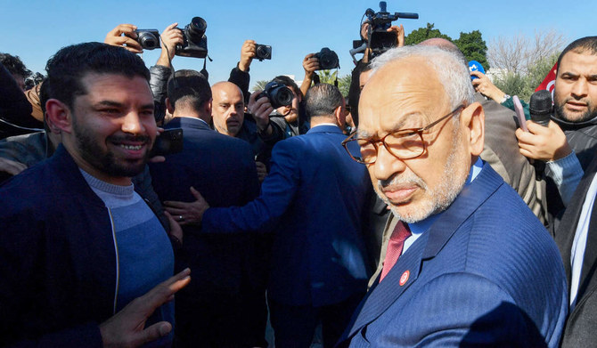 In this file photo taken on February 21, 2023, the head of Tunisia's Islamist movement Ennahdha Rached Ghannouchi arrives to a police station in Tunis. (AFP)