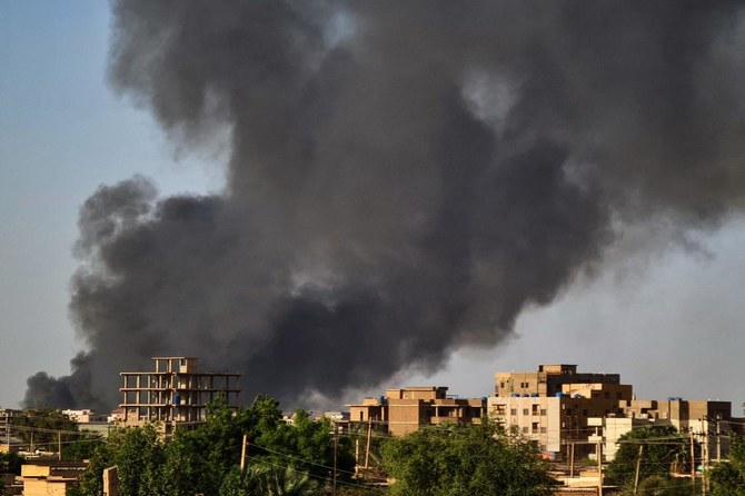 Smoke rises above buildings in Khartoum, as violence between two rival Sudanese generals continues. Khartoum was again rocked by battles, more than a month into a brutal war that has made
