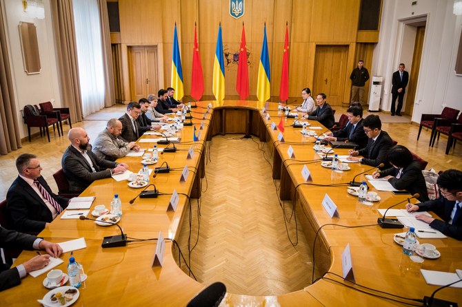 Ukrainian Foreign Minister Dmytro Kuleba (5thL) and China's special envoy Li Hui (4thR) attending a meeting during their talks in Kyiv. Ukrainian Foreign Minister Dmytro Kuleba emphasised the importance of his country's territorial integrity in a meeting with China's special envoy Li Hui (AFP)