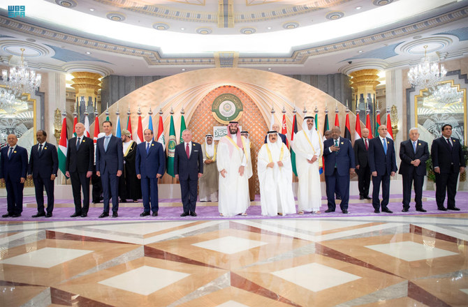 Syria's President Bashar Assad, 4th from left, joins other Arab leaders in a photo session at the close of the Arab League summit in Jeddah on May 19, 2023. (SPA)