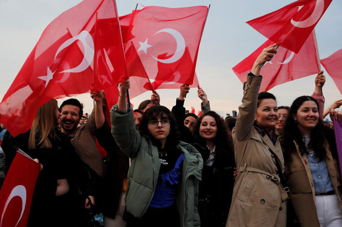 People wave Turkish flags during a gathering to mark the Youth and Sports Day, ahead of the May 28 runoff vote, in Istanbul, Turkey May 19, 2023. (Reuters)