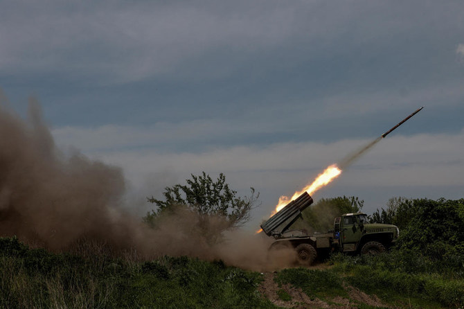 Ukrainian servicemen fire a BM-21 Grad multiple launch rocket system towards Russian troops, amid Russia's attack on Ukraine, near the frontline town of Bakhmut (Reuters)