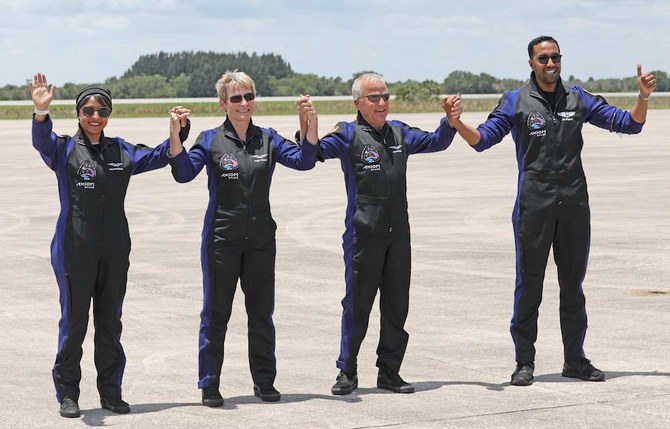 Rayyanah Barnawi (far left), and her colleague Ali Al-Qarni (far right) are set to launch into space on Sunday evening. (AFP)