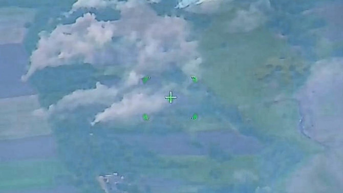 A still image from video, released by Russia’s Defense Ministry, shows what it said to be an aerial attack of Russian armed forces against Ukrainian militants in the Belgorod region, at an unknown location, on May 23, 2023. (Reuters)